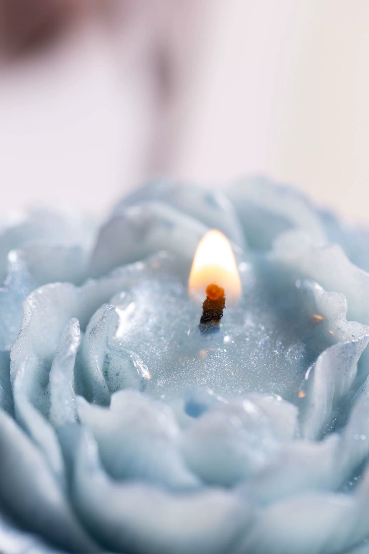 Light blue silver glitter candle